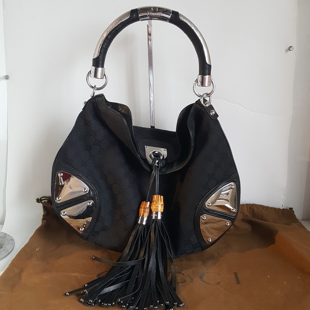 Gucci Black Shoulder Bag with Silver Hardware and Brown Tassel Accents